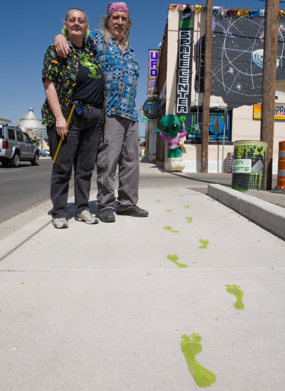 "We would welcome something like an alien roller coaster or a theme park, absolutely," said Sharon Welz, left, who is seen with&nbsp;her husband Larry Welz outside the couple's alien-themed store in Roswell, N.M., on&nbsp;May 22. 