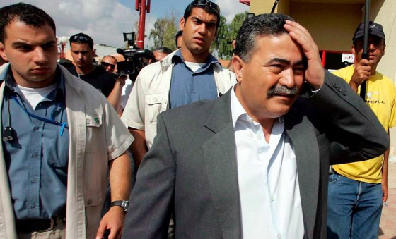 Defence Minister Amir Peretz leaves polling station in Sderot after Labor party primary vote