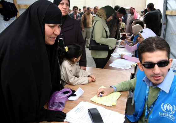 UN staff register an iraqi woman at the
