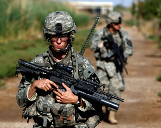 U.S. troops patrol near town of Al-Meshahda