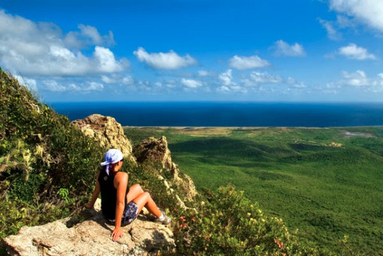 Before venturing underwater, we climb the 1,239-foot summit of Mount Christoffelin Curaçao. Jody enjoys the view from the top.