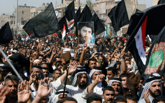 Iraqi Shi'ites protest in the streets against the bombing of Samarra's Golden Mosque, in Baghdad's Sadr City