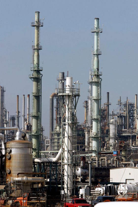 Oil industry representatives say if the need for gas stays flat due to ethanol use, there's no need to build more refineries. Consumer advocates say fewer facilities make it easier to keep gas prices high.