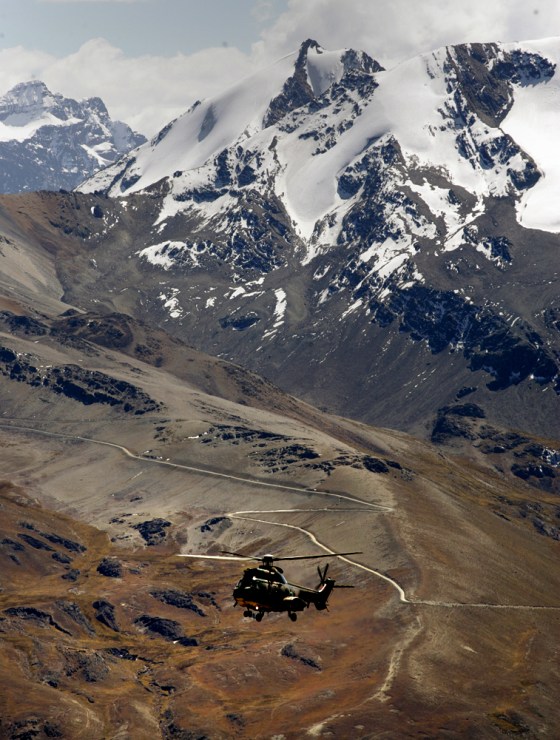 A Bolivian military helicopter flies 05