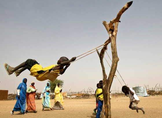 Chadian children play in the Shalaya refugee camp south of the Darfur town of Al-Geneina, Sudan, on April 25, 2007.