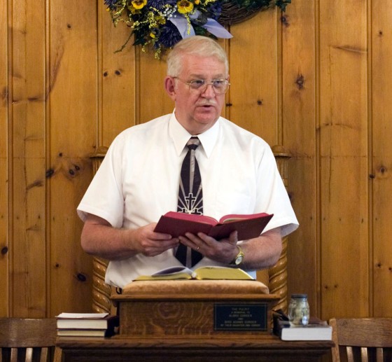 The Rev. Danny Fleming preaches at Big Isaac United Methodist Church in Big Isaac, W.Va. Sunday, May 20. Fleming, a part-time pastor, holds a full-time job with the U.S. Army in Clarksburg, W.Va., while he ministers to two churches some Sundays and three churches on other Sundays.