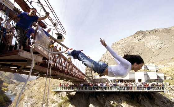 Quench your thirst for thrill by bungee jumping in New Zealand. But be careful — some patrons have been known to leave clothing items in the river during "splashdown."