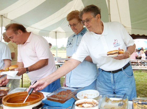 Don Hartman, right, and his wife Ann enjoy some time at a UAW Local 1714 retirees picnic in Lordstown, Ohio Wednesday, July 11, 2007. Hartman worked for General Motors for over 40 years.