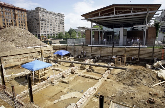 ** FOR IMMEDIATE RELEASE--FILE **Shown are the remains of buildings including the house George Washington lived in when he was president at the sight of an archaeological dig in front of the Liberty Bell Center, top right, in Philadelphia, in this June 5, 2007, file photo. Archaeologists unearthing the buried remains of Washington's presidential home have discovered a hidden passageway and other ruins, still intact, used by his nine slaves. (AP Photo/Matt Rourke/FILE)