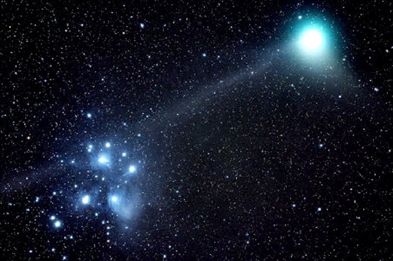 Isolated locales with dark skies make for ideal stargazing opportunities, like this one of Comet Macholz going through Pleiades.
