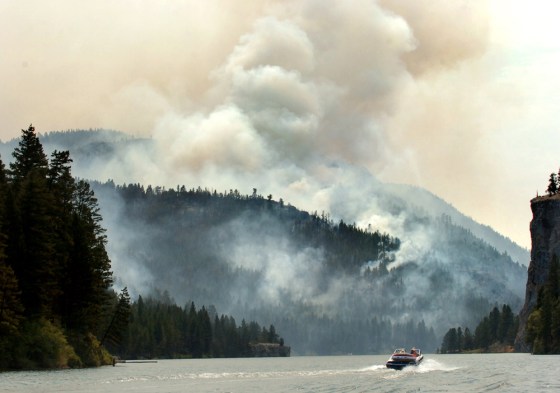 The fire inside the Gates of the Mountain Wilderness area produced plenty of smoke Thursday as it burned near the Missouri River north of Helena, Mont.