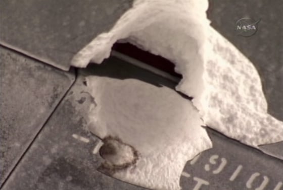 A close-up shows the gouge in the shuttle Endeavour's belly tiles after Tuesday's landing. NASA officials say the gouge was eroded a bit more during atmospheric re-entry, but not nearly as much as some feared.