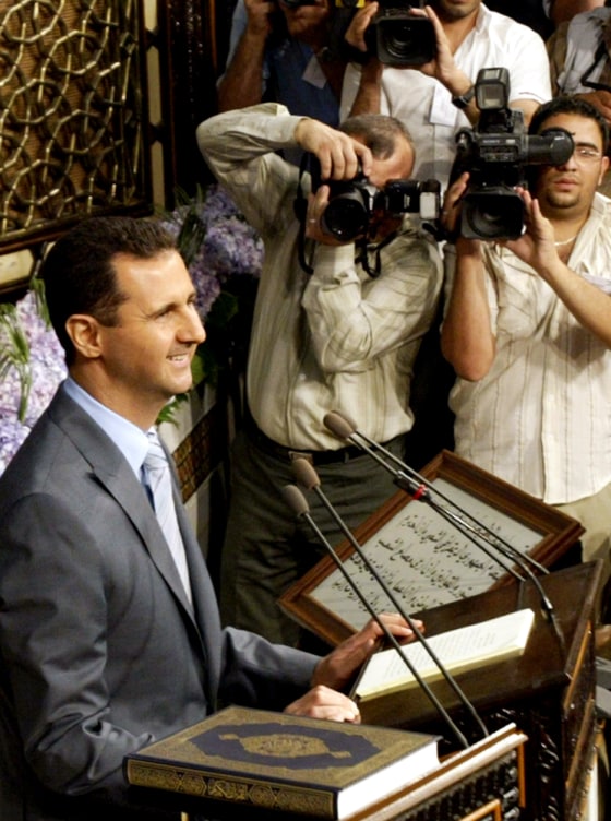 Photographers take pictures of Syrian Pr