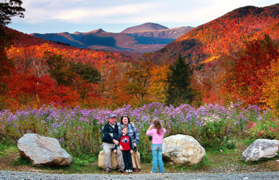 Wildflowers, fall foliage and 6,288-foot Mt. Washington serve as a backdrop for Jim and Kathleen Gannon and their son James as their daughter Katarina snaps a picture at Crawford Notch State Park in New Hampshire last fall.