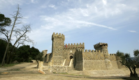 The facade of the Castello di Amorosa is seen in Calistoga, Calif. Daryl Sattui is king of a wine country castle—complete with drawbridge, dungeons and nifty little slots for the old boiling oil trick.