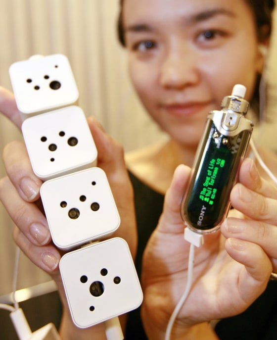 Sony unveils the new bio battery, four cubic cells that generate enough electricity to drive a Walkman digital music player at the company's headquarters in Tokyo 23 August 2007.