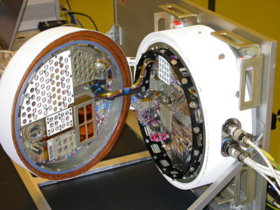 The BIOPAN compartment, shown here, is designed to carry out experiments requiring direct exposure to the harsh environment of space. The European Space Agency's "Life Marker Chip" is one of 10 different experiments that will test biological experiments in space.