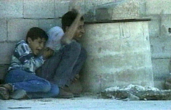 Footage captured on Sept. 30, 2000, depicted the death of Mohammed al-Dura, left. The images showed the terrified boy and his father, Jamal, cowering in front of a wall amid a furious exchange of fire between Israeli forces and Palestinian militants in the Gaza Strip.