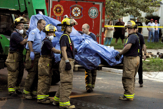 Michigan firefighters and paramedics removed a 900-pound man from the upper floor of a home Tuesday night.