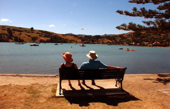 Vacationers enjoy the sunshine in the French-accented town of Akaroa, on the Banks Peninsula near Christchurch in New Zealand's South Island.