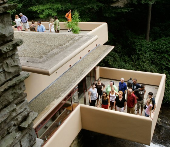 Visitors to Fallingwater, one of the architect Frank Lloyd Wright's best-known works, listen to tour guides as they stand on the terraces in Big Run, Pa. Another Wright creation, the Duncan House, has been moved from Lisle, Ill., to western Pennsylvania. Tours of the two impressive homes, Fallingwater and nearby Kentuck Knob, are available as well as the opportunity for an overnight stay in the 1950s-era Duncan House.