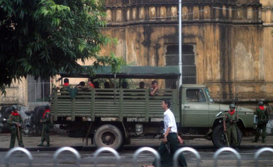 Soldiers deploy along the street leading to Sule Pagoda in Yangon, Myanmar, on Monday.