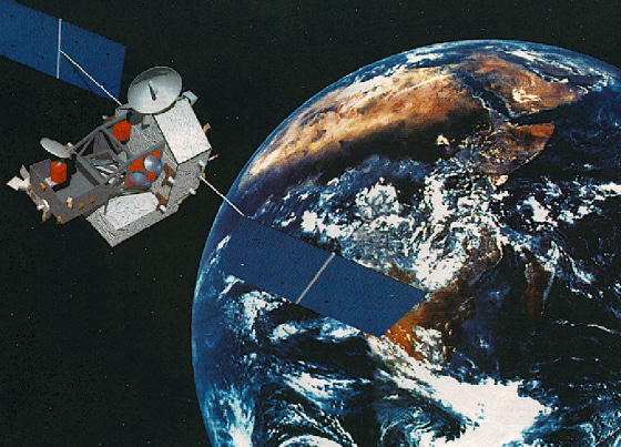 An artist's conception shows the Tropical Rainfall Monitoring Mission satellite in orbit.