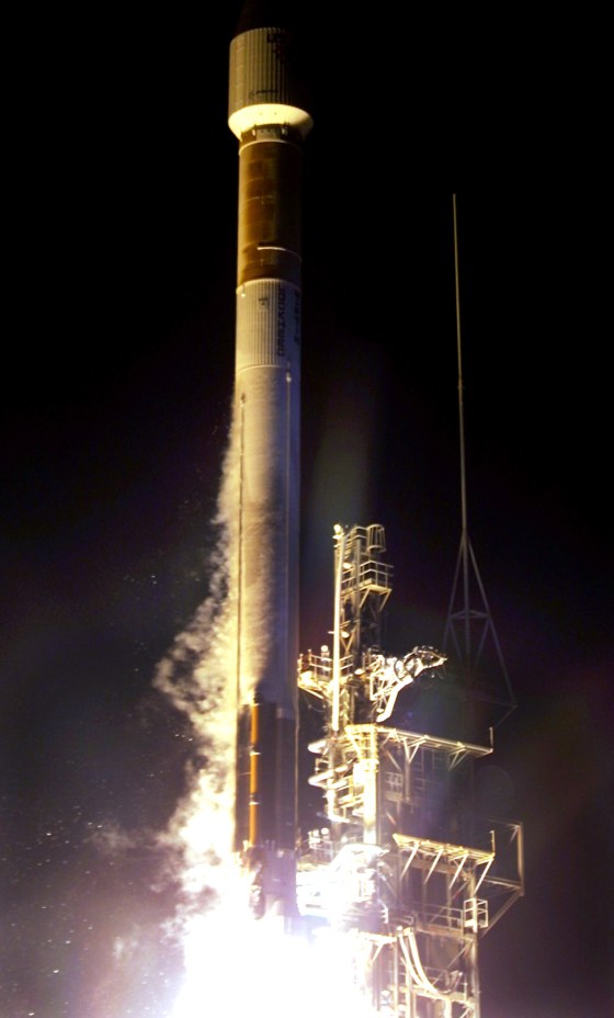 ATLAS IIIB LIFTS OFF AT CAPE CANAVERAL ON 100TH ANNIVERSARY OF WRIGHT BROTHERS FLIGHT