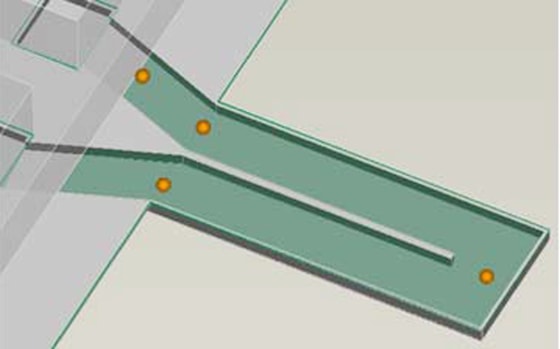 MIT researchers have developed a tiny chip that can be used to weigh single cells or particles. As particles flow through the devices, the frequency of vibration of the cantilever (green) is slightly altered, allowing the mass of particles to be calculated.