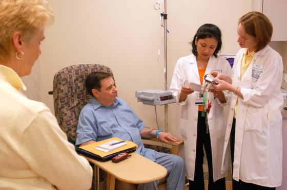 Ted Seugling, who has a type of plasma cell cancer called multiple myeloma,&nbsp;awaits a blood transfusion in May&nbsp;at the Cancer Institute of New Jersey in New Brunswick.&nbsp;With treatment costs skyrocketing,&nbsp;many cancer centers are hoping to make gains on the prevention side.