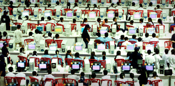 INDIAN SCHOOL CHILDREN USE COMPUTERS IN BANGALORE