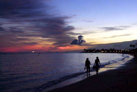 The sun sets on Waikiki, in Honolulu, Hawaii.