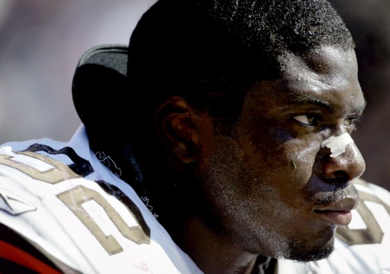 Courtney Brown watches the game