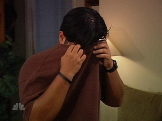 Paul Clemente hides inside his shirt during the lastest filming of 'To Catch a Predator' in Long Beach, Calif. He pled not guilty in court.