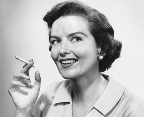 Image: Portrait of woman holding cigarettte