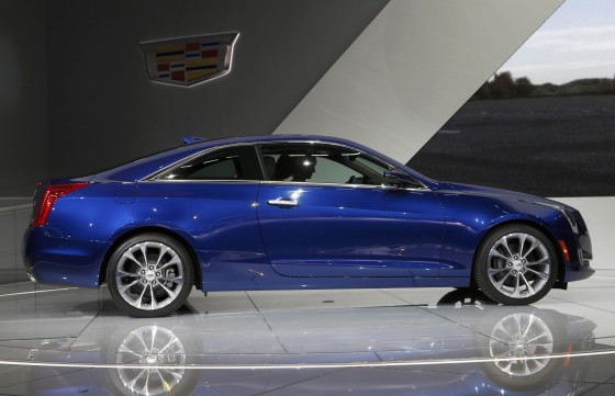 The Cadillac ATS Coupe is unveiled during the press preview day of the North American International Auto Show in Detroit