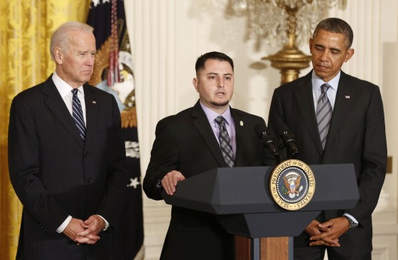 Image: U.S. President Obama and Vice President Biden listen to apprentice electrician Varela of Pacific Gas and Electric discuss his previous unemployment , in East Room of White House in Washington