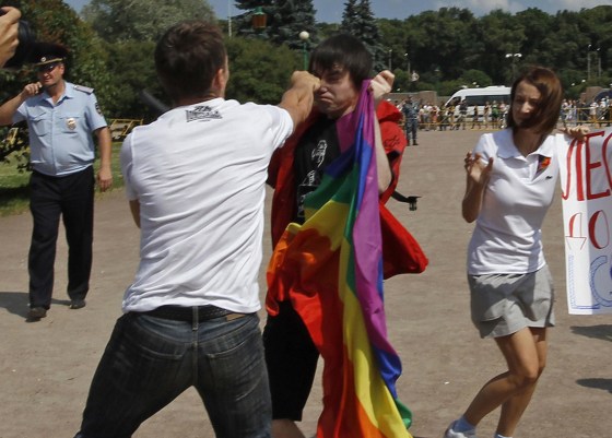 An anti-gay protester clashes with a gay rights activist during a Gay Pride event in St. Petersburg