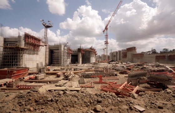 Image: Cranes and machinery lie idle at the construction site of the Panama Canal