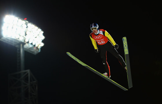 Image: Severin Freund of Germany jumps during the Men's Normal Hill Individual Ski Jumping training