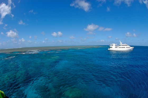 Image: A ship sails on the western Pacific Ocean near the Great Barrier Reef, Australia