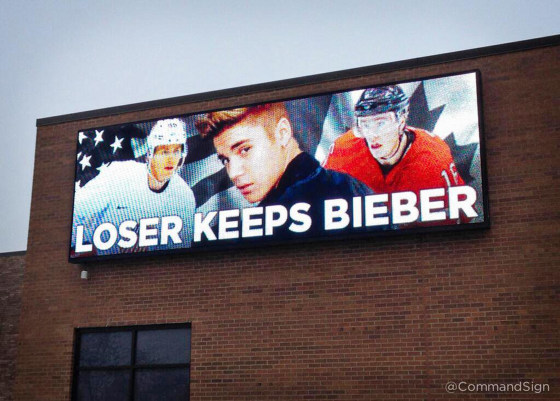 Image: A Command Transportation billboard in Skokie, Ill., proposes, in jest, the loser of the Olympics mens hockey final keeps Justin Bieber.