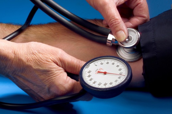 A patient gets his blood pressure measured with a sphygmomanometer and a stethoscope in Iserlohn, Germany on Sept. 17, 2005.