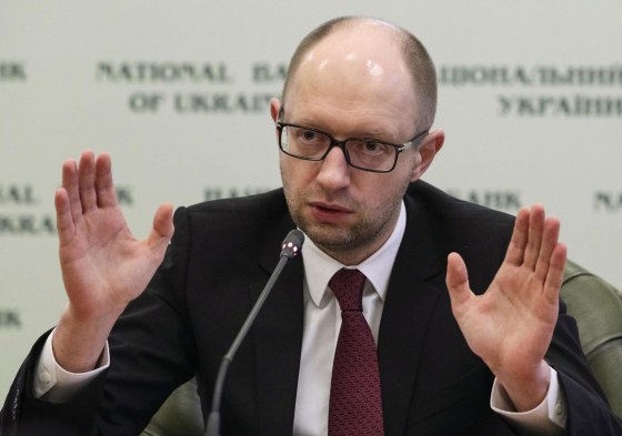 Image: Ukraine's new Prime Minister Arseny Yatseniuk speaks during a news conference in Kiev