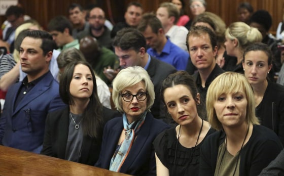 Image: The family members of Pistorius sit in court ahead of his trial in Pretoria