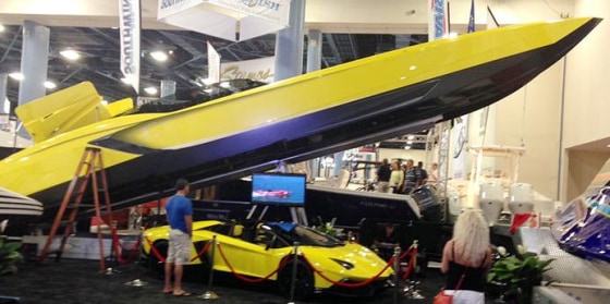 The Aventador and the yellow Lamborghini that inspired it, at the Miami Boat Show.