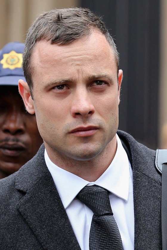 Oscar Pistorius leaves North Gauteng High Court in Pretoria, South Africa, during a break in his murder trial on Wednesday.
