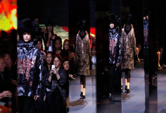 Models present creations from the Fall/Winter 2014/15 Ready to Wear Collection by Moncler during Paris Fashion Week, in Paris, France, March 5, 2014.