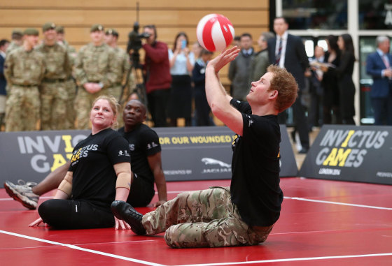 Image: Prince Harry plays sitting volleyball at the launch of the Invictus Games