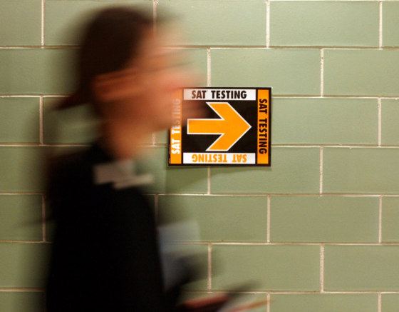 A student taking the SAT at Upper Arlington High School in Upper Arlington, Ohio, leaves after completion of the test on March 12, 2005.